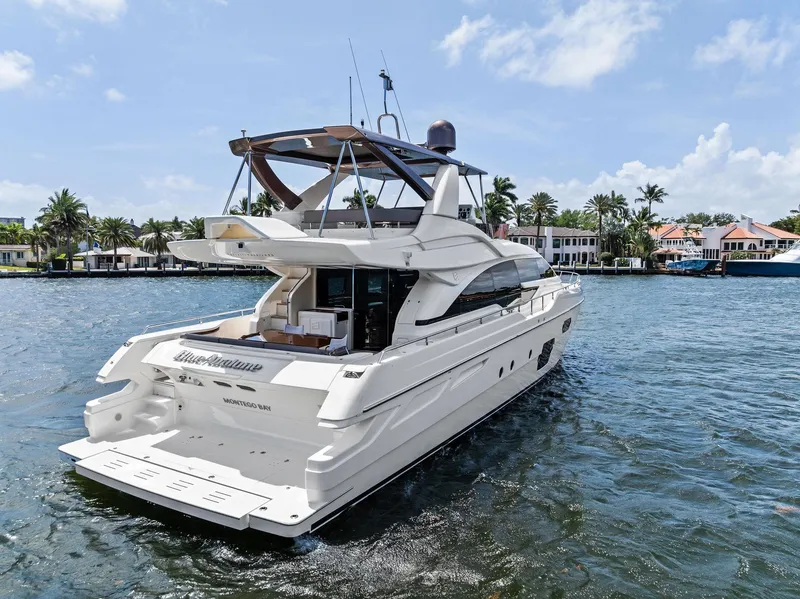 Slide: The Image of 2015 Ferretti Yachts 690 cruising on a sunny day, showcasing luxury and elegance. - 8