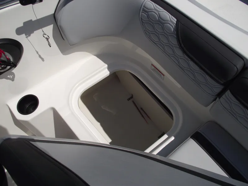Slide: The Image of 2024 Bayliner Element M17 boat interior storage compartment. - 11