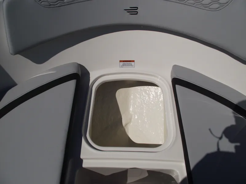 Slide: The Image of 2024 Bayliner Element M17 bow storage compartment. - 26