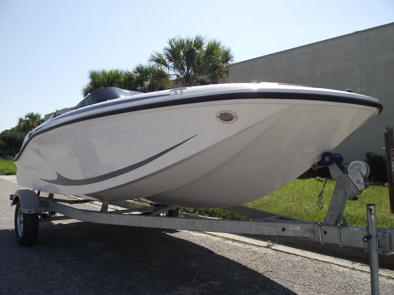Slide: The Image of 2024 Bayliner Element M17 boat on trailer, side view. - 27