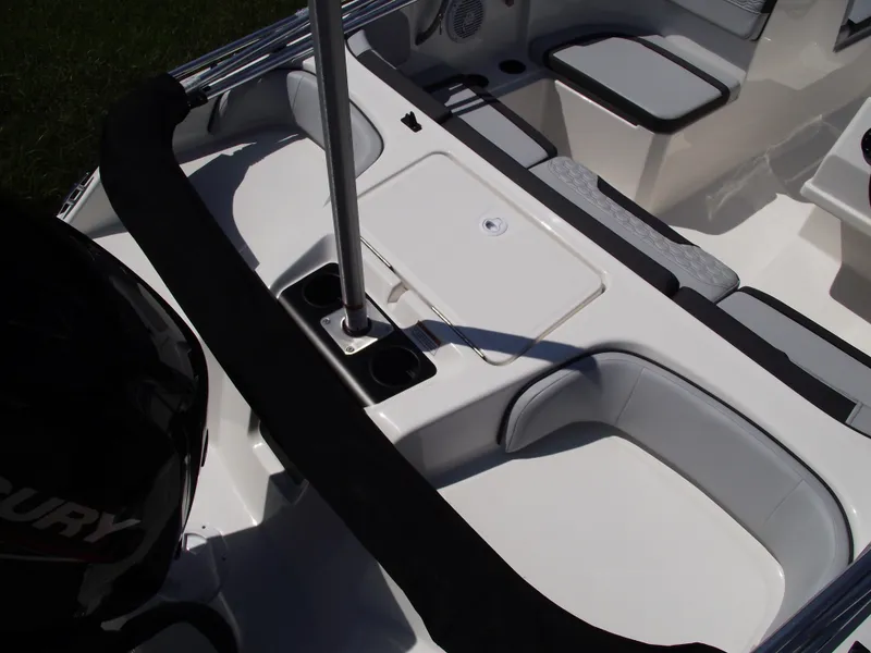 Slide: The Image of 2024 Bayliner Element M17 boat interior with seating and storage compartments. - 7