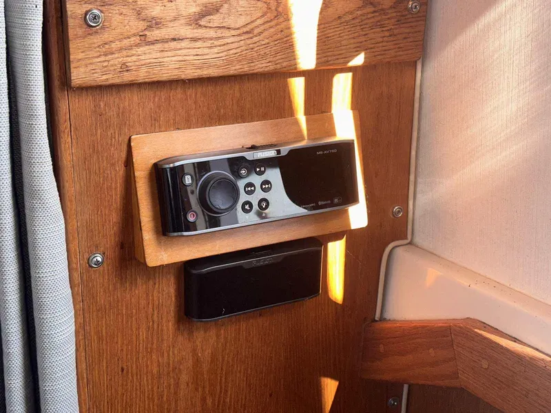 Slide: The Image of Control panel on 1987 Silverton 40 Double Cabin boat, mounted on wooden interior. - 28