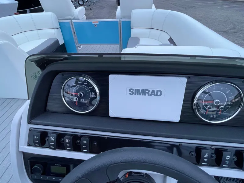 Slide: The Image of Dashboard view of 2024 Godfrey Sweetwater 2086 BF pontoon boat with Simrad display. - 10