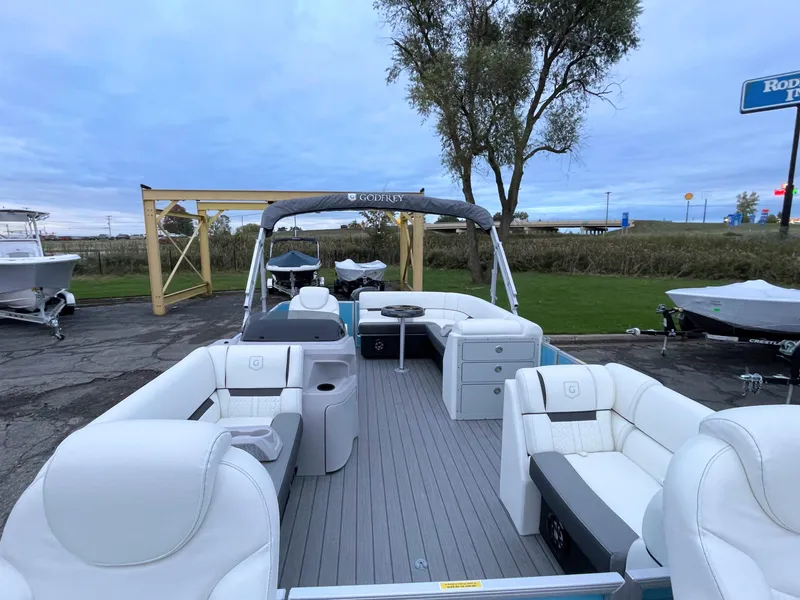 Slide: The Image of 2024 Godfrey Sweetwater 2086 BF pontoon boat with white seating and canopy. - 3