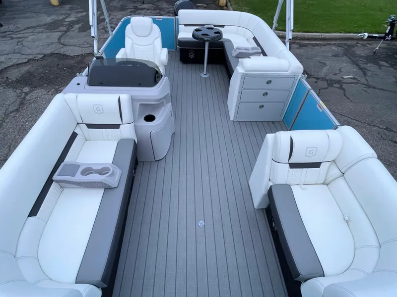 Slide: The Image of 2024 Godfrey Sweetwater 2086 BF pontoon boat interior with white and gray seating. - 4