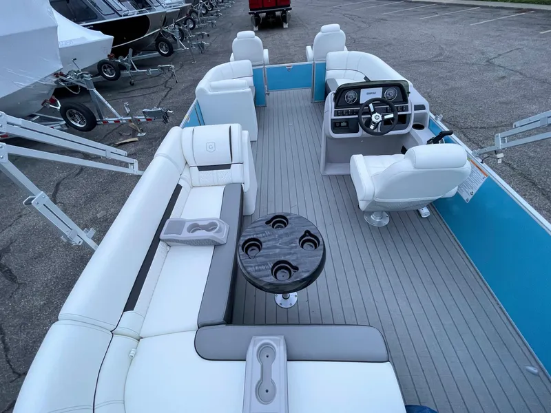 Slide: The Image of 2024 Godfrey Sweetwater 2086 BF pontoon boat interior with seating and steering console. - 5