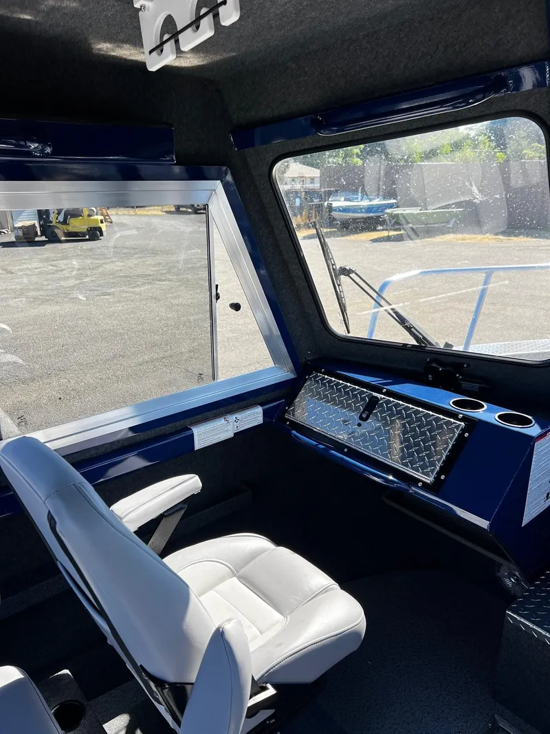 Slide: The Image of Interior of 2024 Thunder Jet 22 Alexis Pro boat with white seating. - 12