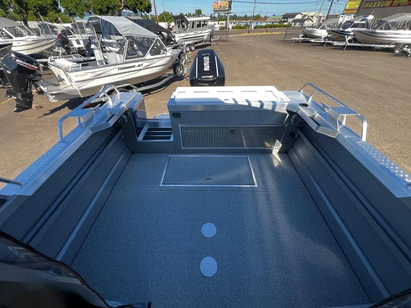 Slide: The Image of 2024 Thunder Jet 22 Alexis Pro boat interior, spacious deck, and modern design. - 19