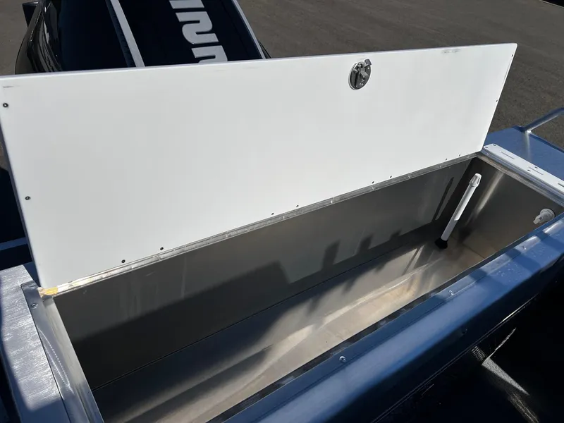Slide: The Image of 2024 Thunder Jet 22 Alexis Pro storage compartment open. - 23