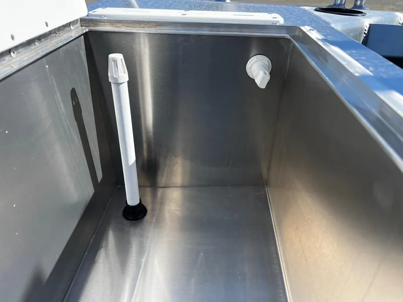 Slide: The Image of 2024 Thunder Jet 22 Alexis Pro stainless steel livewell with drain and aerator. - 24