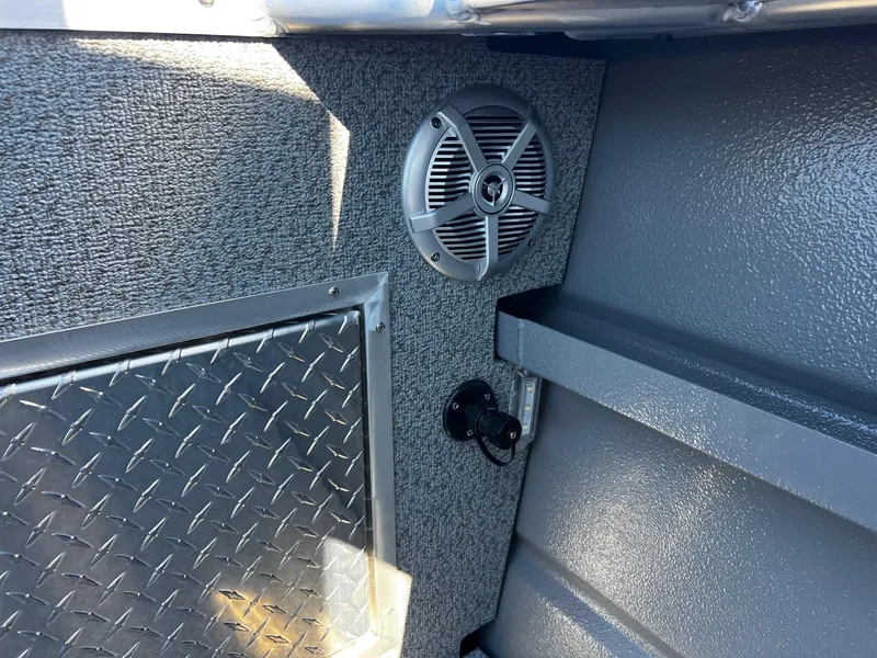 Slide: The Image of 2024 Thunder Jet 22 Alexis Pro interior speaker and textured panel. - 28