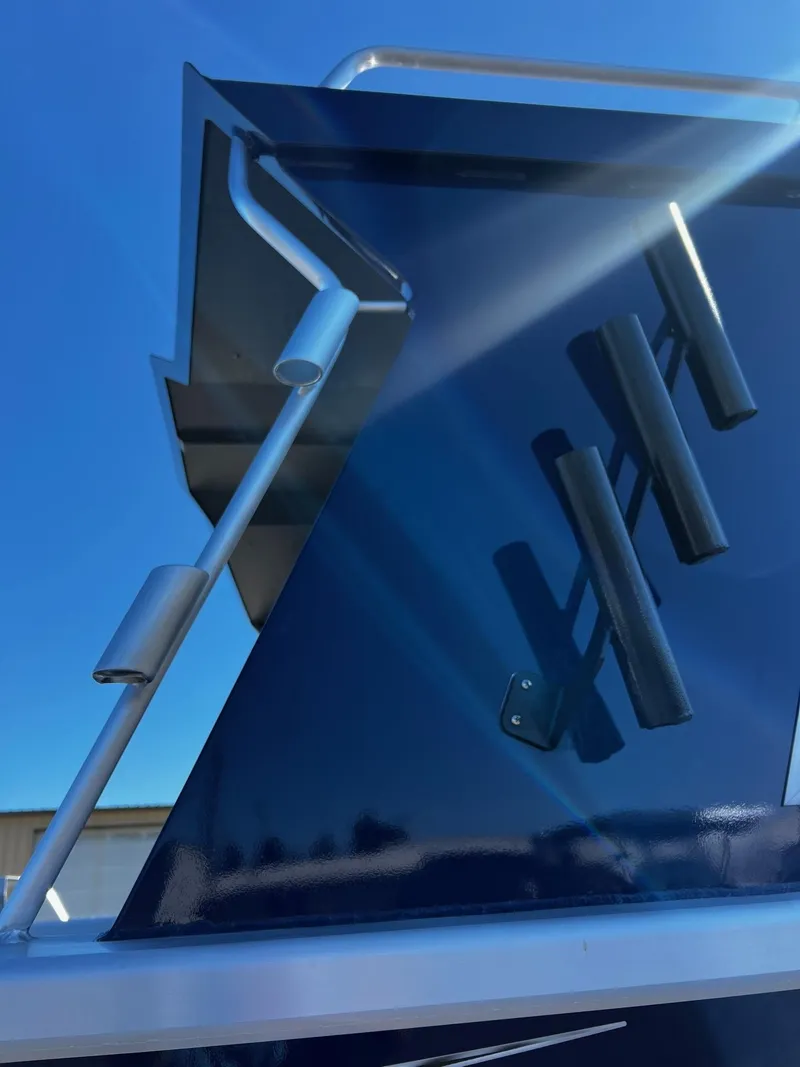 Slide: The Image of 2024 Thunder Jet 22 Alexis Pro boat with rod holders and hydraulic system. - 8