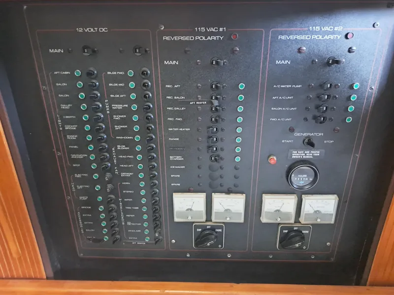 Slide: The Image of Electrical control panel of a 1989 Carver 3807 Aft Cabin boat. - 36