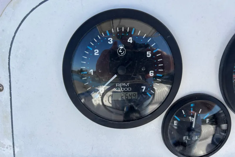 Slide: The Image of Close-up of 2004 Pro-Line 20 Sport boat tachometer and fuel gauge. - 10