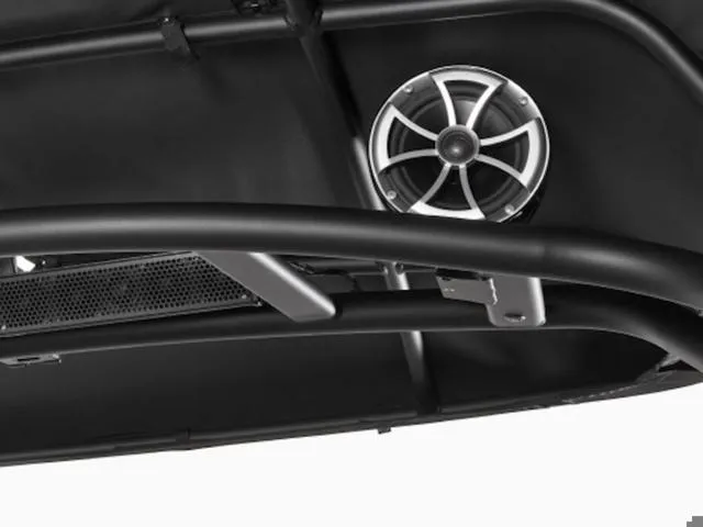 Slide: The Image of Close-up of 2024 Yamaha Boats 255XD steering wheel with illuminated controls. - 5