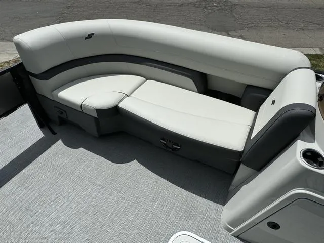 Slide: The Image of 2024 Starcraft EXS 3 HB4 boat interior with white and gray seating. - 10