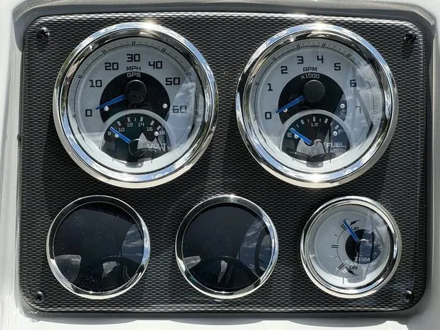 Slide: The Image of Dashboard gauges of 2024 Starcraft EXS 3 HB4 boat. - 17