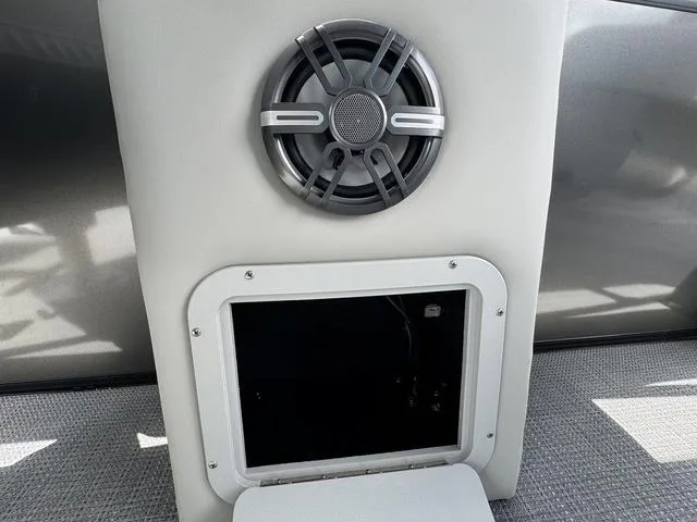 Slide: The Image of 2024 Starcraft EXS 3 HB4 boat speaker and storage compartment. - 21