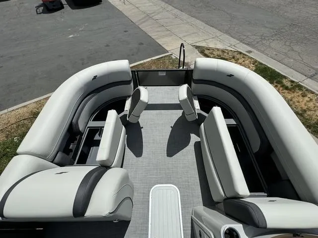 Slide: The Image of 2024 Starcraft EXS 3 HB4 pontoon boat with spacious seating and modern design. - 25
