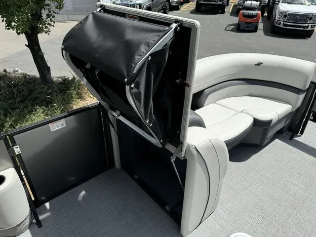 Slide: The Image of 2024 Starcraft EXS 3 HB4 pontoon boat interior with seating and storage. - 29