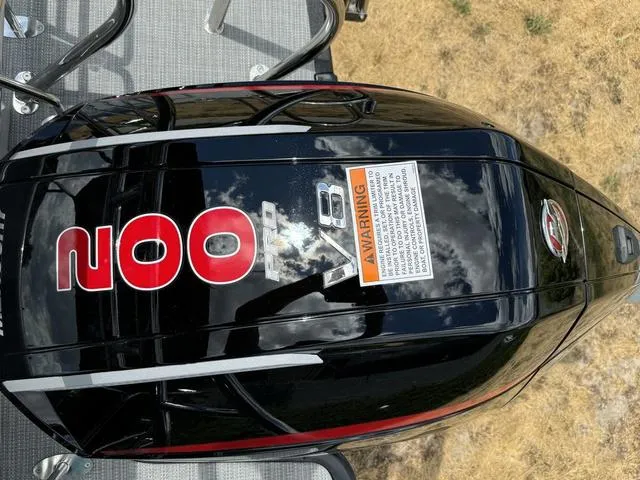 Slide: The Image of 2024 Starcraft EXS 3 HB4 boat engine with warning label. - 8