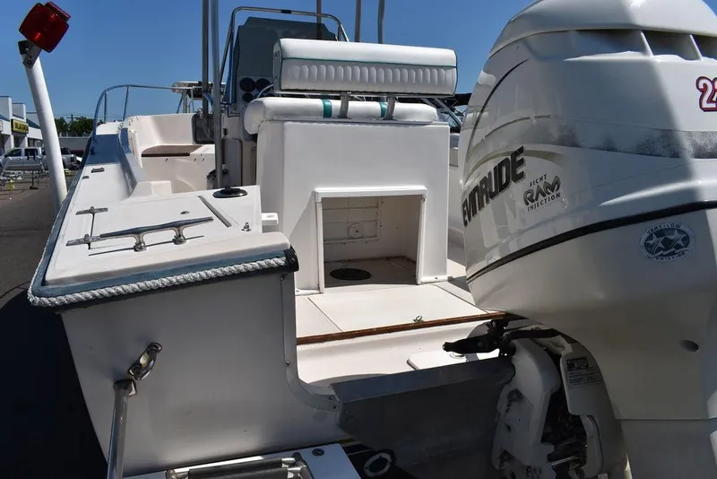 Slide: The Image of 1987 Chris-Craft 213 SeaHawk CC boat with Evinrude outboard motor, rear view. - 10