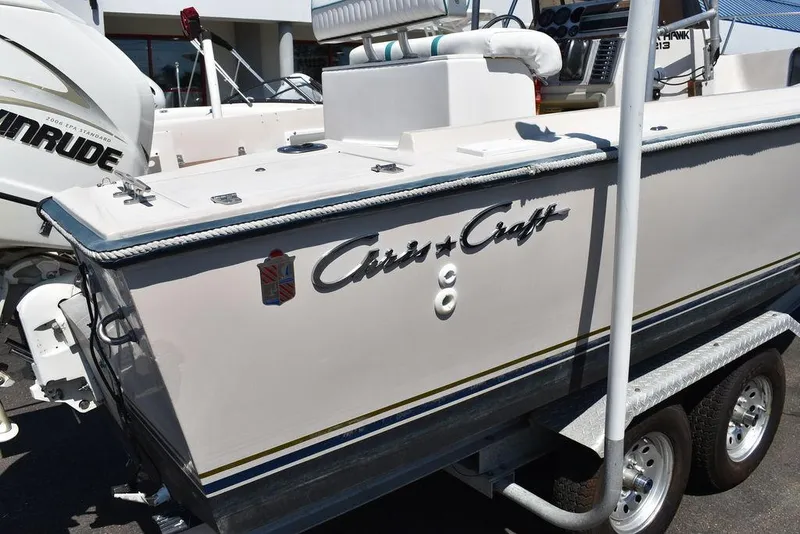 Slide: The Image of 1987 Chris-Craft 213 SeaHawk CC boat on a trailer, side view. - 14