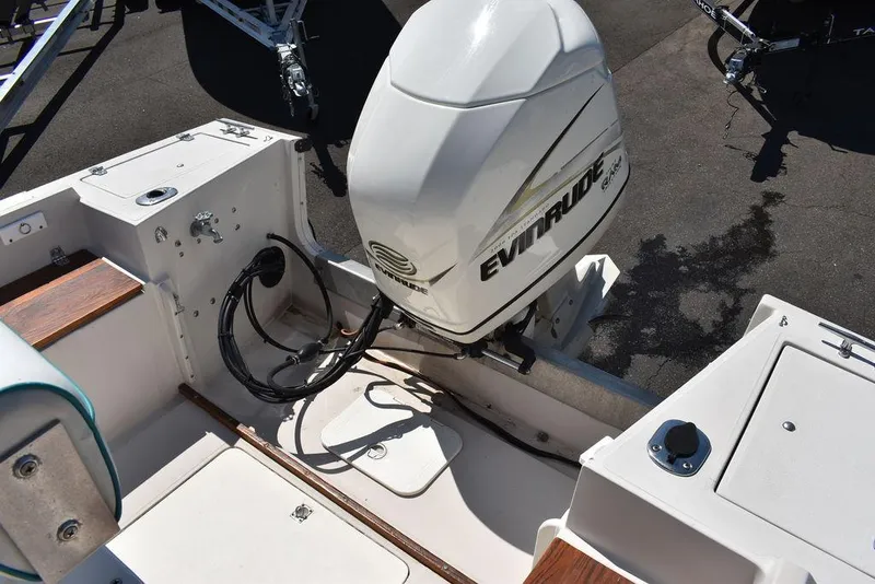 Slide: The Image of 1987 Chris-Craft 213 SeaHawk CC boat with Evinrude outboard motor. - 29