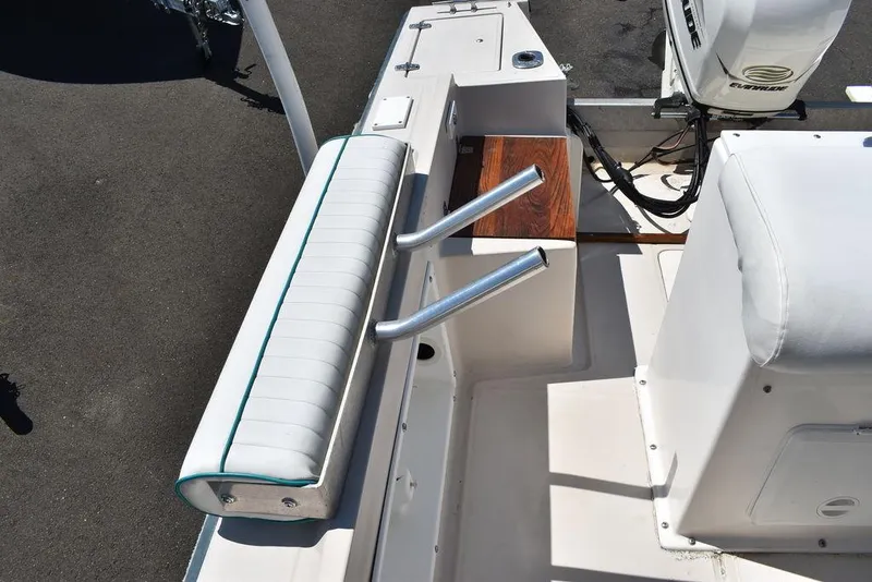 Slide: The Image of 1987 Chris-Craft 213 SeaHawk CC boat interior with seating and rod holders. - 41