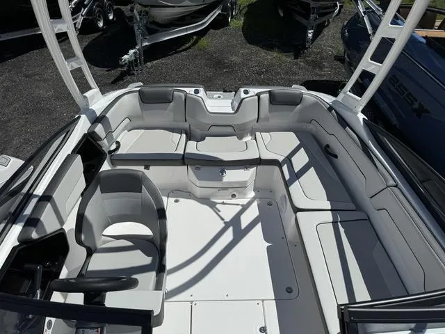 Slide: The Image of 2024 Yamaha Boats AR190 interior with seating and steering wheel. - 10