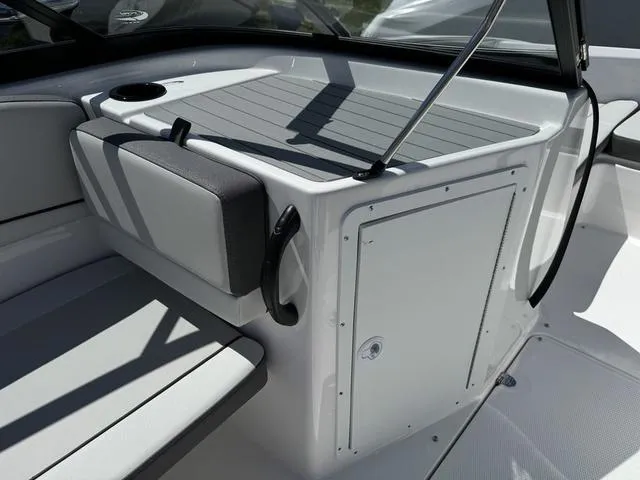 Slide: The Image of 2024 Yamaha Boats AR190 interior seating and storage compartment. - 12