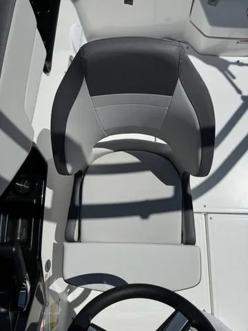 Slide: The Image of Captain's seat of a 2024 Yamaha Boats AR190, featuring sleek, modern design. - 16
