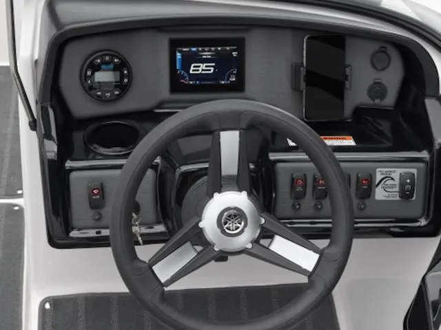 Slide: The Image of 2024 Yamaha Boats AR190 dashboard with steering wheel and digital display. - 30