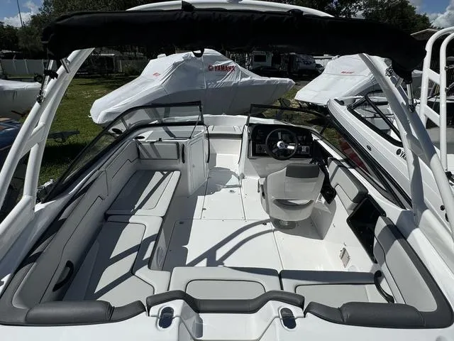 Slide: The Image of 2024 Yamaha Boats AR190 interior view, showcasing seating and helm station. - 4