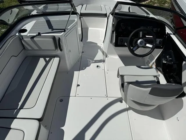 Slide: The Image of 2024 Yamaha Boats AR190 interior with seating and steering console. - 6