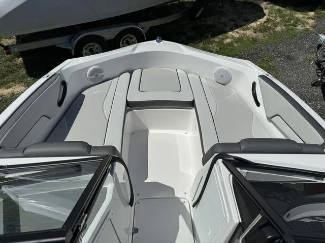 Slide: The Image of 2024 Yamaha Boats AR190 interior seating and bow area. - 7