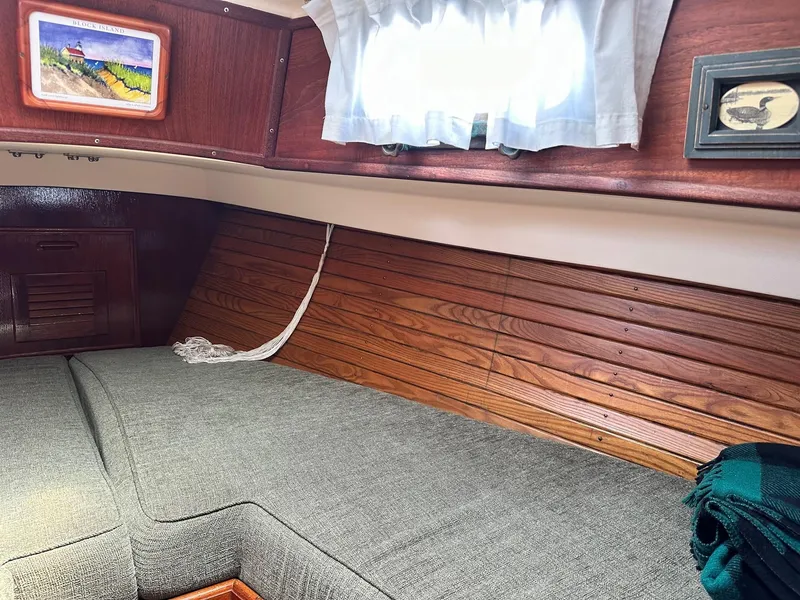 Slide: The Image of Interior of 1982 Cape Dory 30 sailboat with cozy cabin and nautical decor. - 29