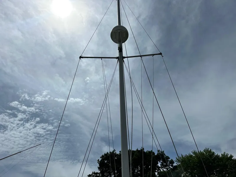 Slide: The Image of Mast of 1982 Cape Dory 30 sailboat against cloudy sky. - 6