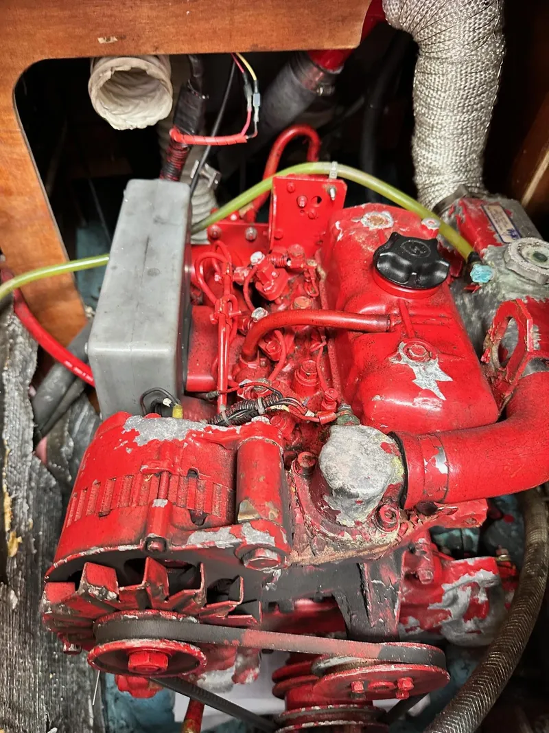 Slide: The Image of 1986 Sabre 30 Sabre MK III engine compartment with red-painted engine components. - 38