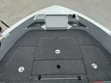 Slide: The Image of 2024 Ranger 1850MS boat deck with storage compartments and control panel. - 12