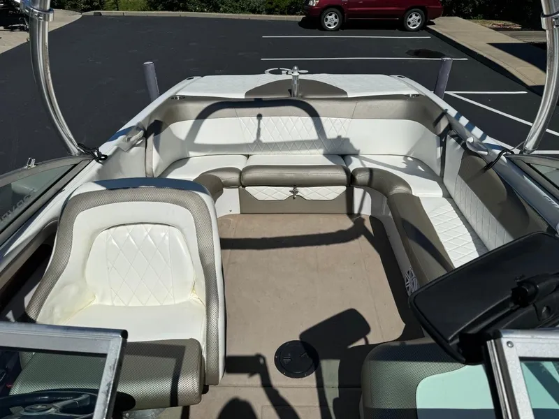 Slide: The Image of 2000 MasterCraft MariStar 230 VRS boat interior with white and gray seating. - 14