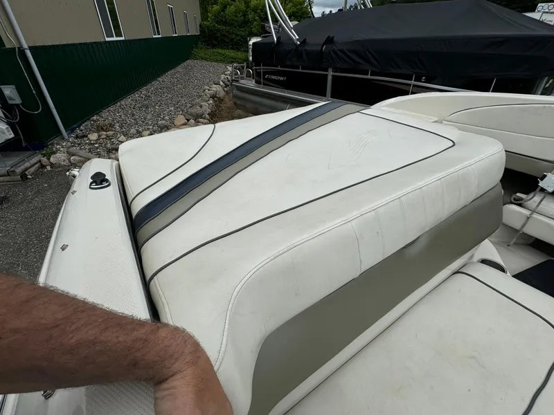 Slide: The Image of 2007 Sea Ray 220 Select boat with white and gray seating. - 3