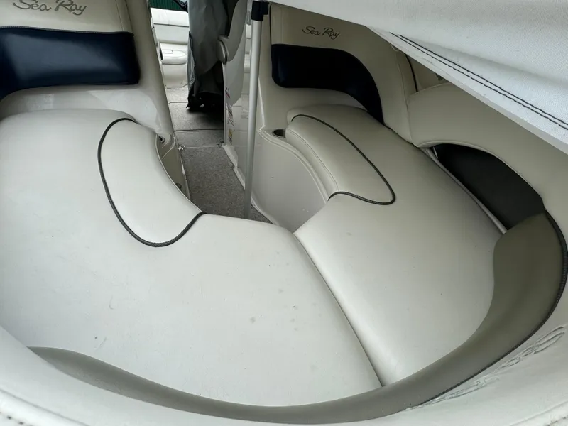 Slide: The Image of 2007 Sea Ray 220 Select boat interior with white and black seating. - 4