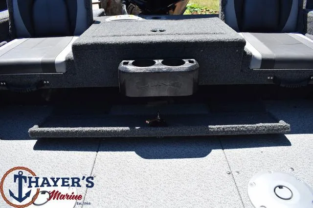 Slide: The Image of 2025 Lund 1775 Adventure SS boat interior with Thayer's Marine logo. - 16