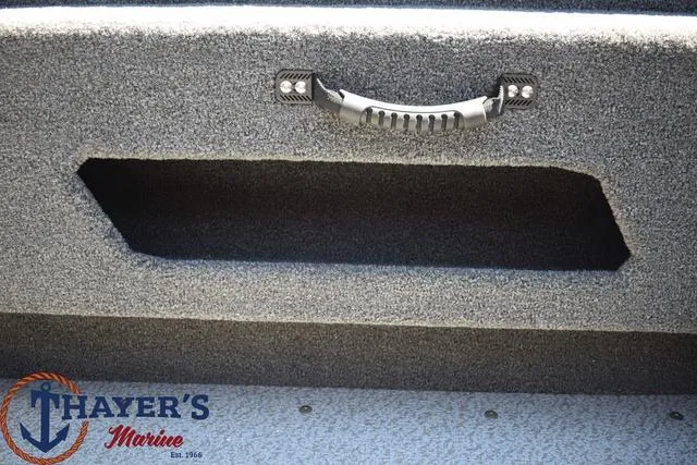 Slide: The Image of Handle and storage compartment on 2025 Lund 1775 Adventure SS boat at Thayer's Marine. - 17