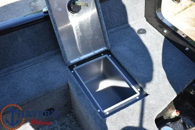 Slide: The Image of 2024 Tracker Pro Guide™ V-16 WT boat interior storage compartment. - 16