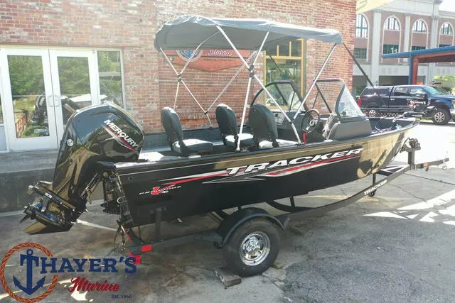 Slide: The Image of 2024 Tracker Pro Guide™ V-16 WT boat on trailer at Thayer's Marine. - 24
