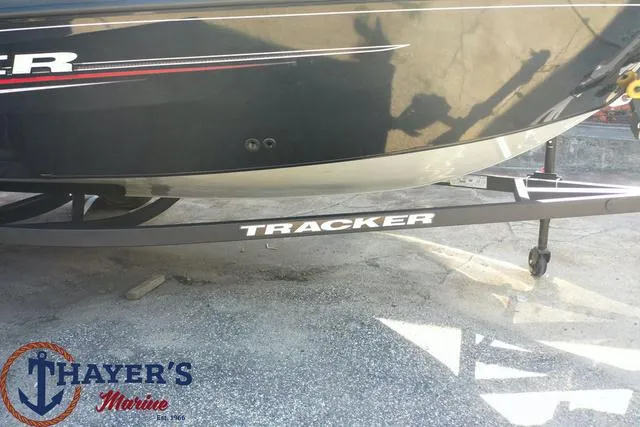 Slide: The Image of 2024 Tracker Pro Guide™ V-16 WT boat on trailer at Thayer's Marine. - 28