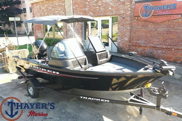 Slide: The Image of 2024 Tracker Pro Guide™ V-16 WT boat at Thayer's Marine dealership. - 29