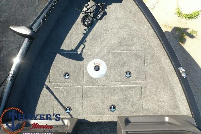 Slide: The Image of 2024 Tracker Pro Guide™ V-16 WT boat deck with storage compartments. - 30